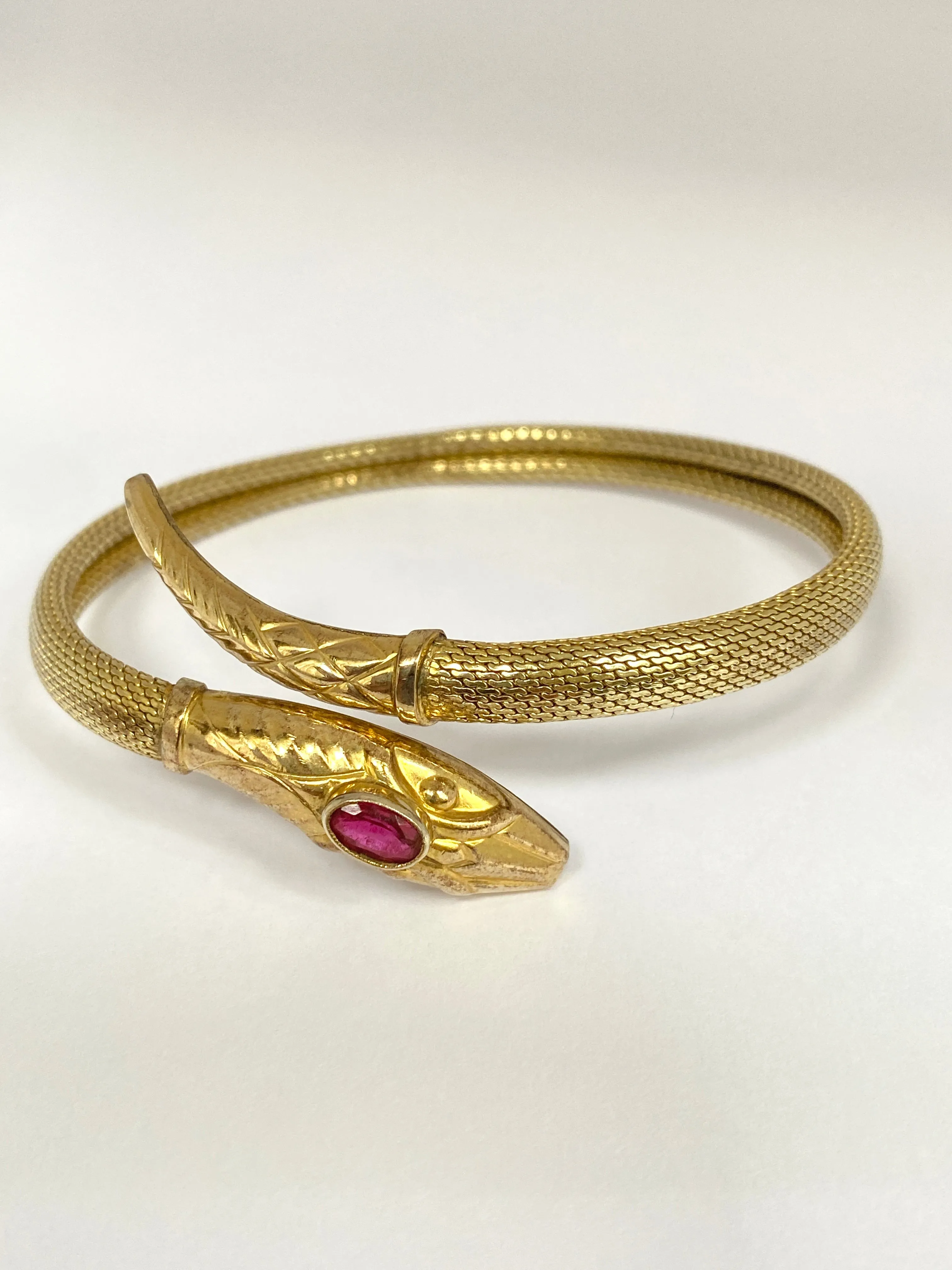 Incredible Art Deco, Extendable Snake Bangle with Ruby Paste, Hallmarked for Rolled Gold.